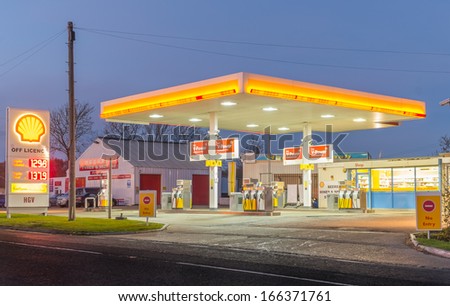 BEDFORD ENGLAND - DEC 7: Shell filling station on December 7th, 2013 in Bedford, England.Shell has operations in 90 countries produces 3.1M barrels of oil/day and has 44,000 service stations worldwide