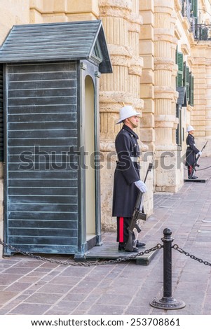 VALLETTA, MALTA - Feb 5th 2015:Sentry on guard prior to the changing of the guard which is a ceremony that takes place at 10AM each day at the Presidential Palace in  St Georges Sq in Valletta