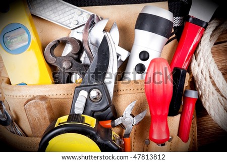 Close up of tools on a tool belt