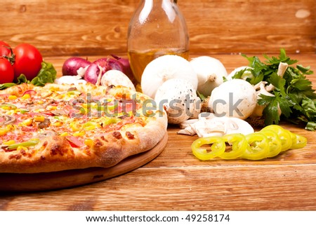 Pizza ( tomato pepper olive onion parsley garlic)