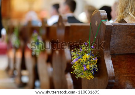 Beautiful wild flowers wedding decoration in a church Beautiful wild flowers wedding decoration in a church