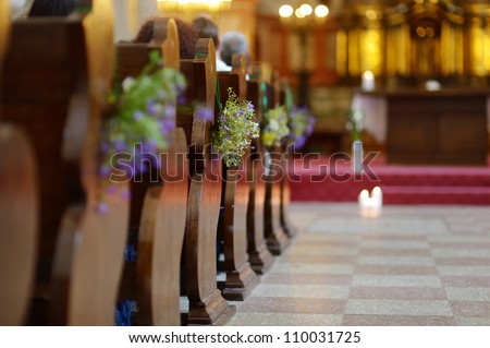 Beautiful wild flowers wedding decoration in a church Beautiful wild flowers wedding decoration in a church