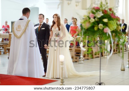 Bride and groom at the church during a wedding ceremony