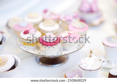 Delicious colorful cupcakes for wedding reception or other event party
