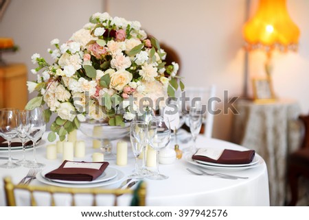 Beautiful table set for some festive event, party or wedding reception