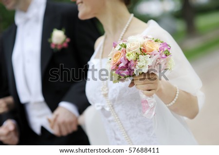 stock photo Bride holding beautiful pink wedding flowers bouquet