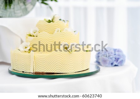 Fancy yellow wedding cake