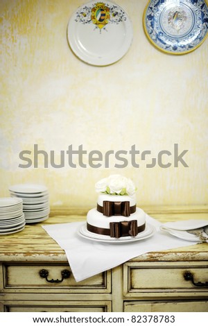 stock photo Delicious white and brown wedding cake