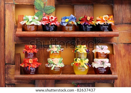 Colorful jam jars arranged for sale