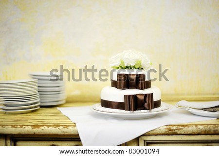 stock photo Delicious white and brown wedding cake