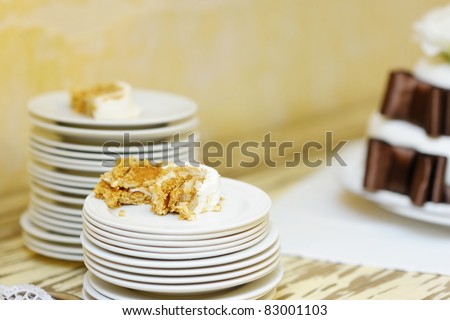 stock photo A piece of white and brown wedding cake