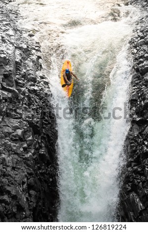 Courageous Kayaker In A Vertical Diving Position