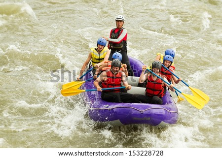 Whitewater rafting boat, group of seven people