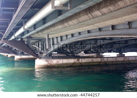 concrete and steel bridge underneath view