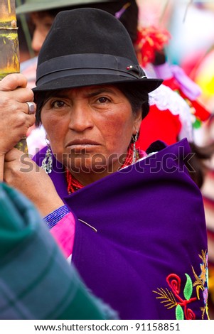 PUJILI,ECUADOR - 25 JUNE : peasant dressed up in traditional costume waits for the beginning of Inti Raymi festival celebrated on 25 June 2011