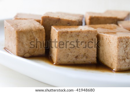 Close up of marinated tofu.