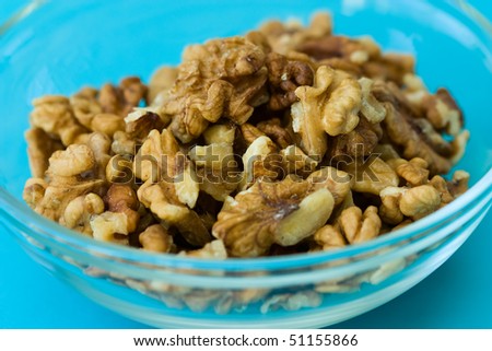 Selective focus image of walnuts which are often in cereal products like muesli.