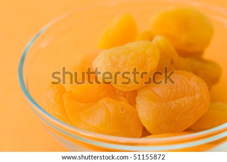 Selective focus image of dried apricots which are often in cereal products like muesli.