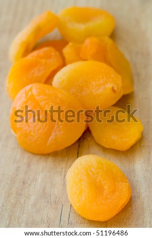 Selective focus image of dried apricots which are often in cereal products like muesli.
