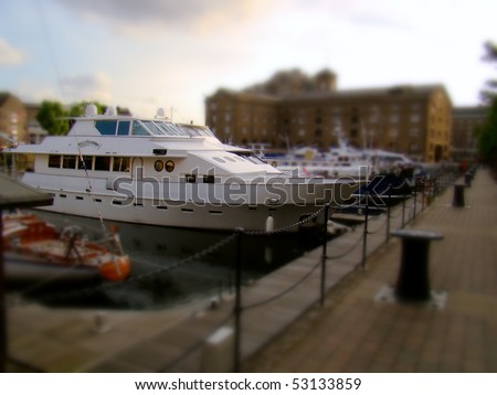 Motor yacht in a London haven, which looks like a miniature landscape (Tilt Shift)
