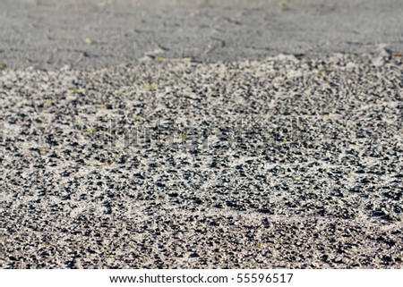 Full frame image of the tarmac of a road, suitable as backgroundi mage.