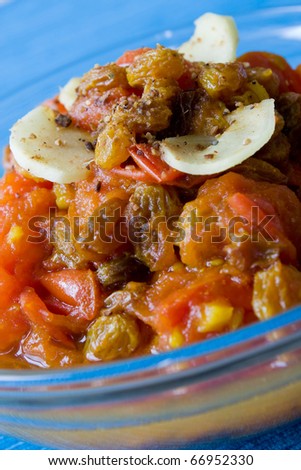 Selective focus image of a tomato chutney, a typcial Indian side dish