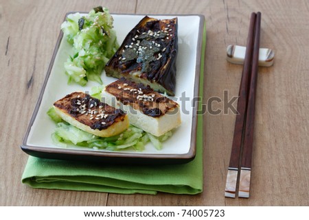 Japanese vegetarian dish made from tofu and aubergines which are marinated with miso and served with cucumber salad and sesame.