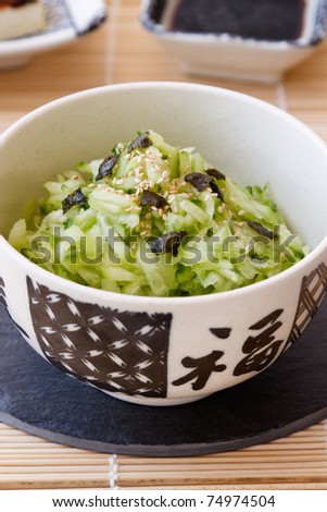 Japanese vegetarian cucumber salad with nori, sesame and soy sauce.