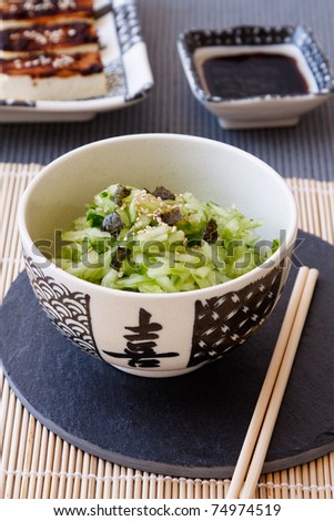 Japanese vegetarian cucumber salad with nori, sesame and soy sauce.