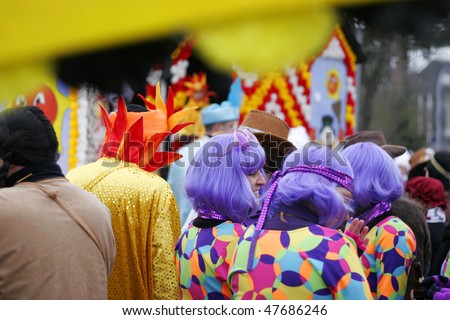 LOWER SAXONY, GERMANY - FEBRUARY 8: People in funny costumes and masquerades celebrate street carnival, February 8, 2010 in Lower Saxony, Germany
