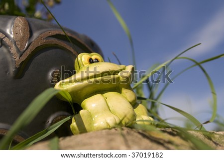 frog sculpture in the garden