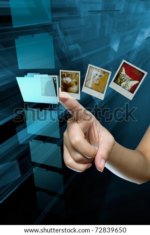 a woman hand  select and open a folder on a screen