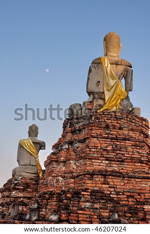 back of buddha statues with moon light