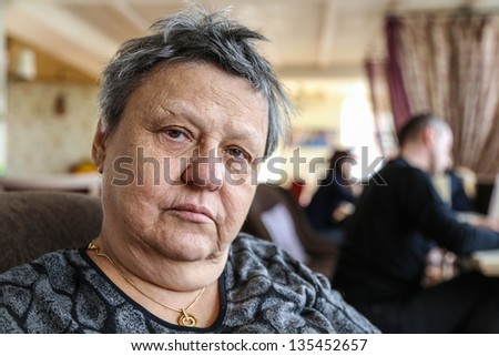 old woman in a cafe