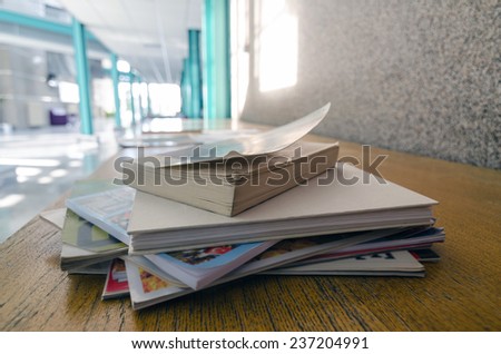 books and magazines on table