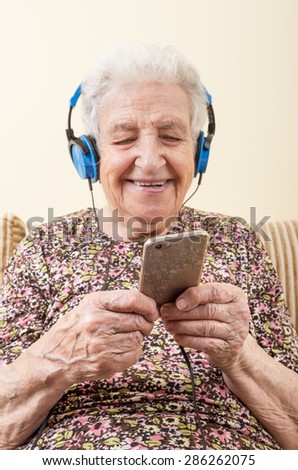 senior woman listening music