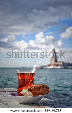 tea and bagel against sea and Maidens Tower in istanbul, Turkey