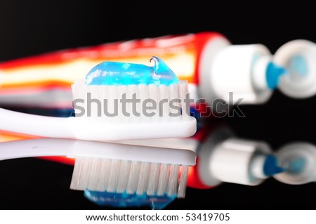 toothbrush and toothpaste tube