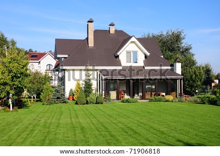 A new house with a garden in a rural area