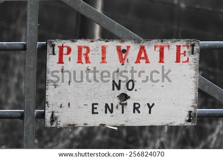 private no entry sign red letters on monochrome