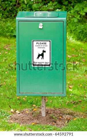 Close Up of Bright Green Dog Mess Poop Bin with Label
