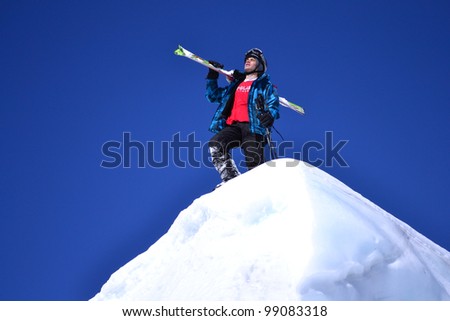skiers on the hill