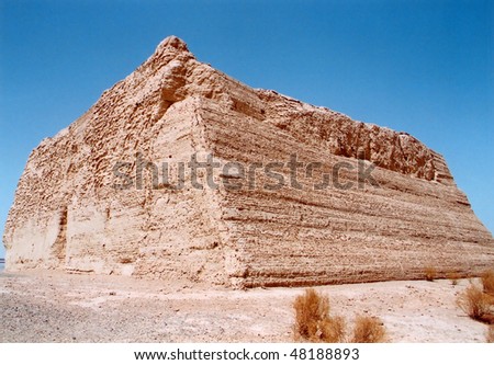 The ancient city gate ruin(Yu Men Gate ruin) in the autumn desert of Sinkiang, China