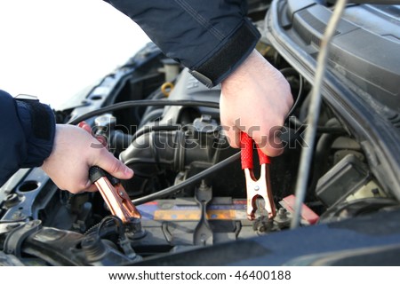 Find Battery on Mechanic Changing The Battery Of A Car Stock Photo 46400188