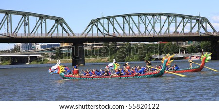 PORTLAND - JUNE 12: Dragon boat races on the Willamette river June 12, 2010 in Portland Oregon.