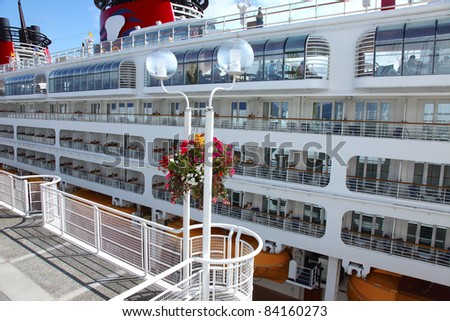 A side view of a cruise ship at Canada Place in Vancouver BC Canada.