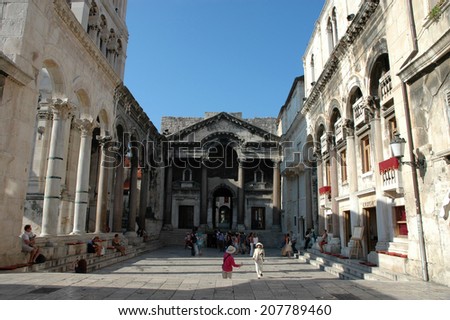 SPLIT, CROATIA - AUGUST 7 : People walk and sit inside the Diocletian palace on AUGUST 7, 2007.  in Split, Croatia. Diocletian palace is in the historical center - UNESCO World Heritage site
