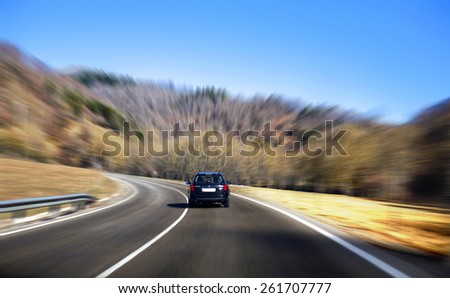 A car driving with high speed with blur background