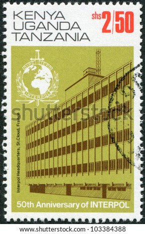 EAST AFRICAN COMMUNITY - CIRCA 1973: A stamp printed in East African Community, is dedicated to the 50th anniversary of Interpol, shows the headquarters building in Saint-Cloud (1966-1989), circa 1973