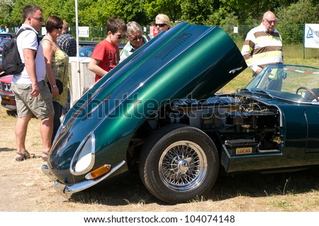 PAAREN IM GLIEN, GERMANY - MAY 26: Open hood of the car Jaguar E-Type, \